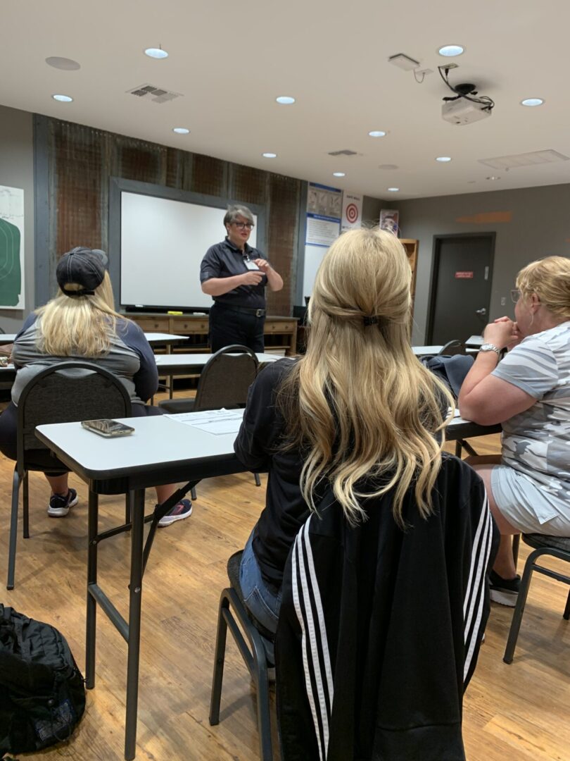 an instructor explaining to students in a classroom